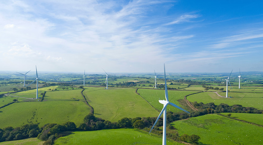 Aerial View Of Onshore Wind Farm In UK Countryside